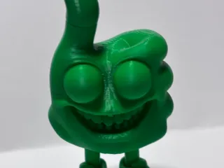 Thumbs up figurine
