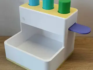 Push-and-Drop Peg Toy