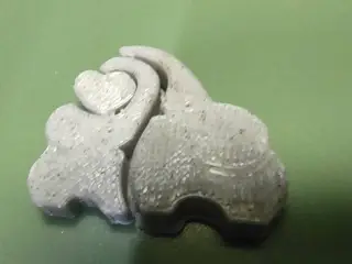 Mother elephant and baby elephant with heart