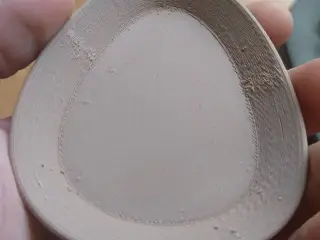 Egg shaped plate