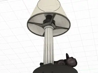 A table lamp with a pissing French bulldog