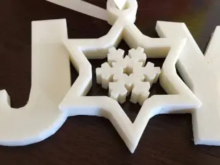 Spinning Joy Snowflake Ornament
