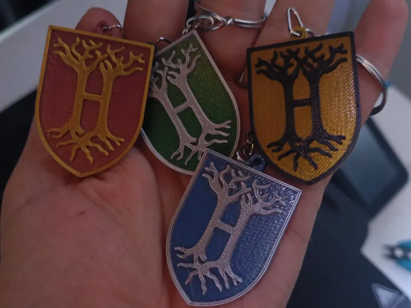 (NO AMS) Llavero - Harry Potter serie hogwarts uniform crest