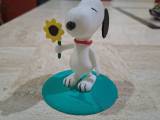 Snoopy con una flor-0