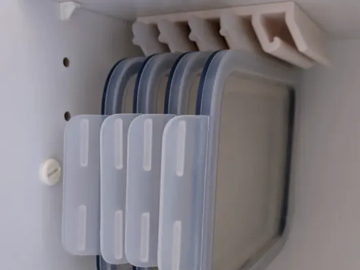 Suporte para tampas Tupperware