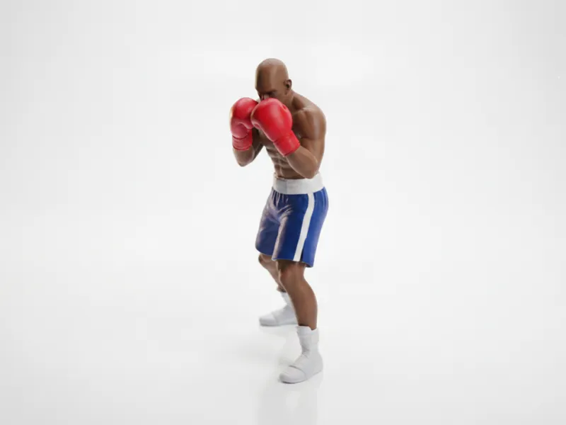 Figurilla de Boxeador en Postura de Combate Imprimible en 3D