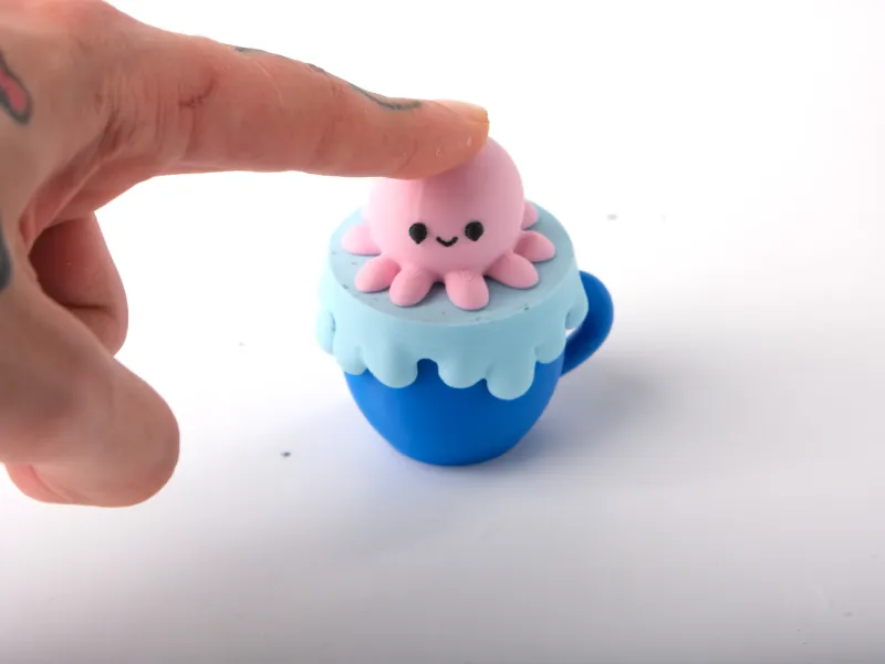Octopus Clicker Toy with a Cup Base