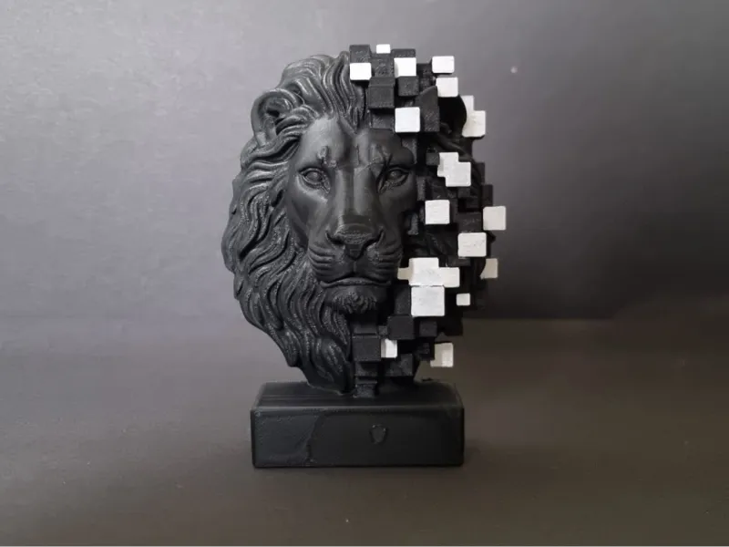 Modern sculpture of a lion’s head