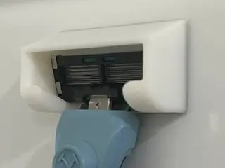 Dollar shaver holder