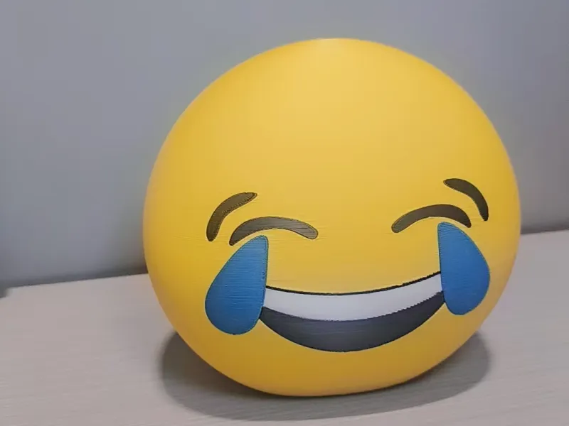Exclusivo na Internet: Cofrinho de Emoji do WeChat - Chorando de Rir