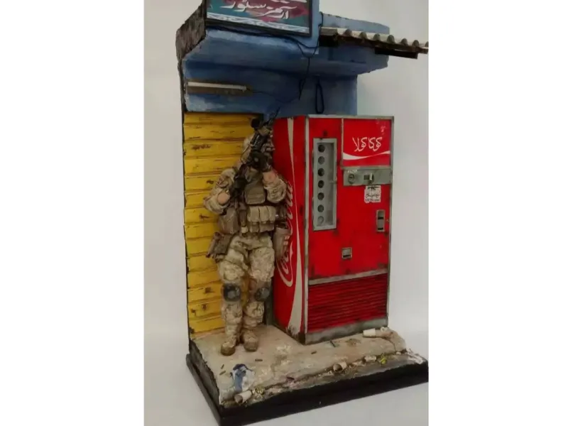 Bewachung des Coca-Cola-Automaten