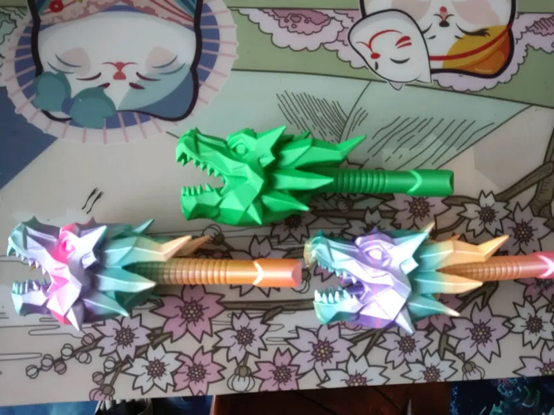 Épée rétractable à tête de dragon