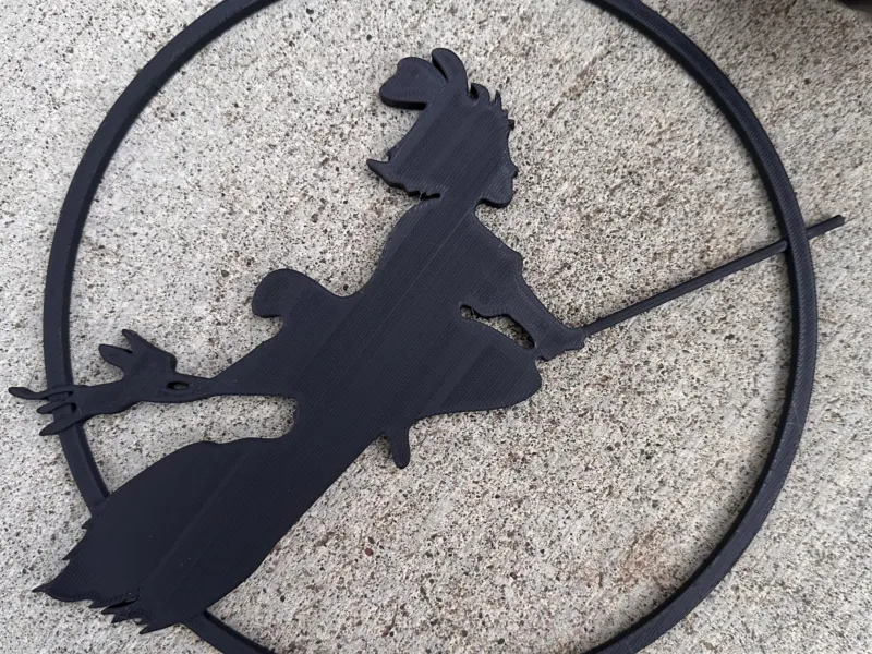 Kiki on broomstick