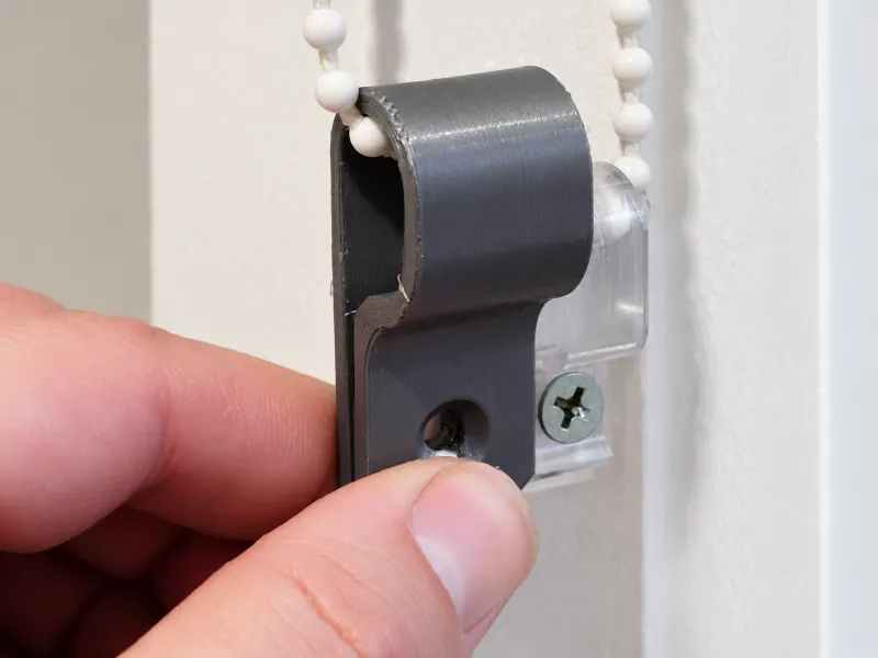 Suporte para corrente de persiana
