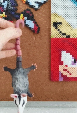 Hanging opossum-0
