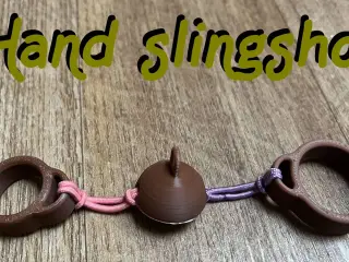 Hand slingshot