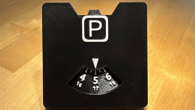 Parking disc for motorcycle with click-stop