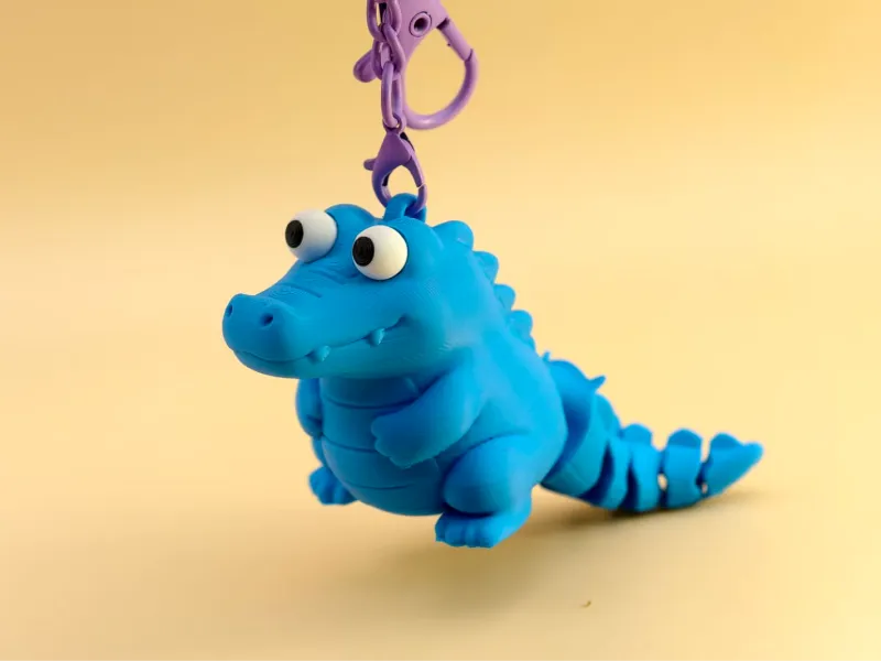 Piccolo coccodrillo dagli occhi grandi