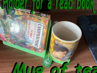 Holder for a read book and a mug of tea