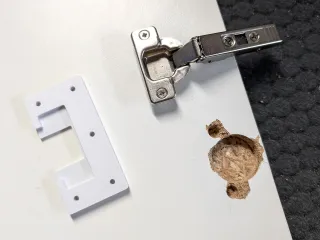 Reinforced replacement for broken kitchen hinge