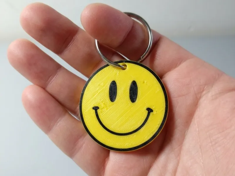 llavero emoji sonriente