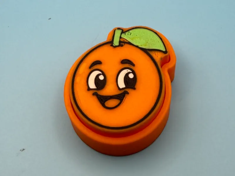 Orange with face Clicker