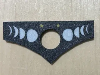 Moon phase page holder