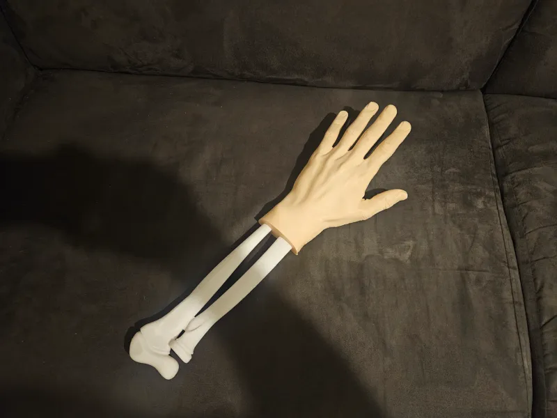 Credit card magic arm