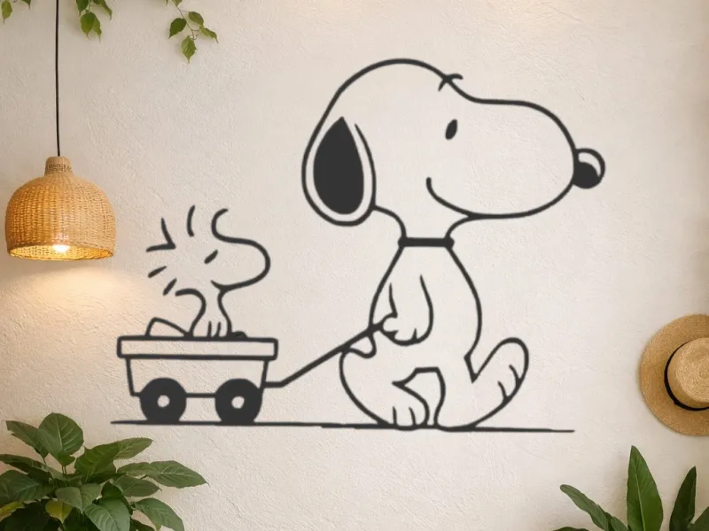 silueta snoopy con pajaro