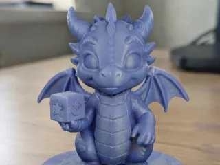 Adorable Baby Dragon with Magic Cube