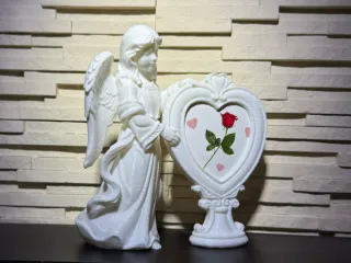 Angel with heart frame