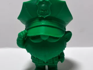 Animated police man figurine