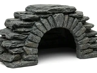 a hiding spot for a terrarium made of pebbles