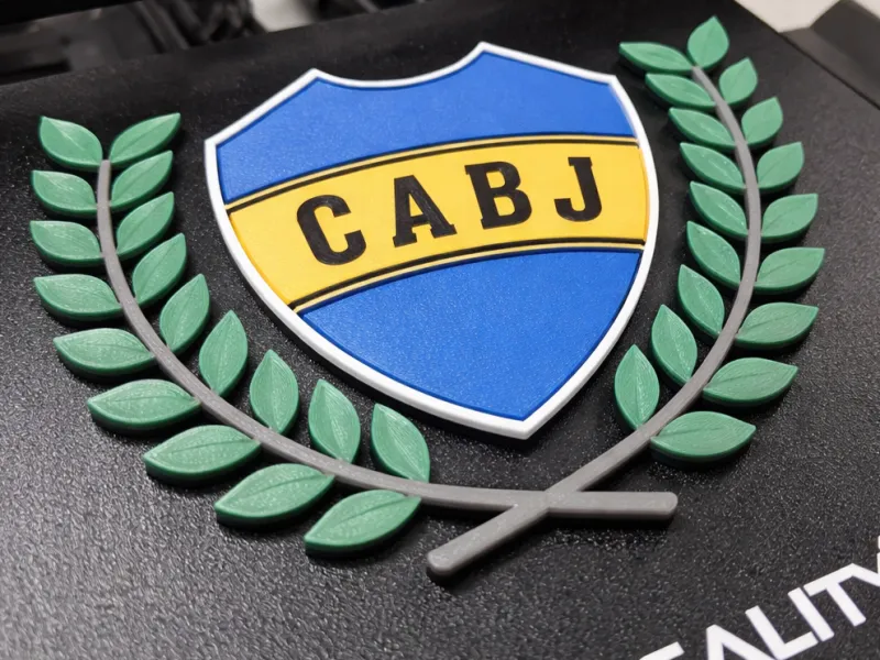 Escudo de boca con laureles