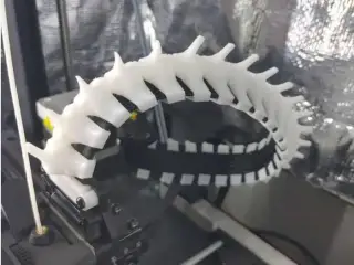 Hot end cable spine/spike chain