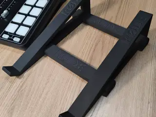 Tilt stand for the Rode Rodecaster Pro 2 mixing console.