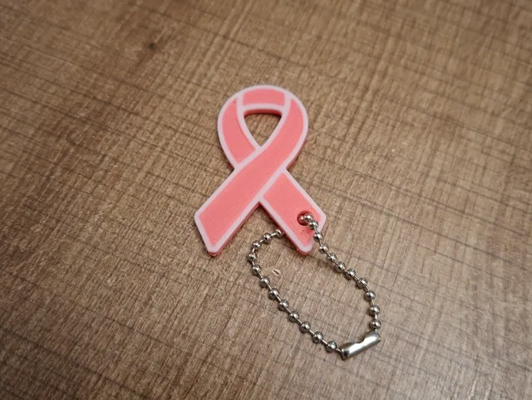 Pink October shopping trolley token keychain