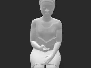 woman sitting reading a book