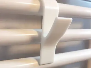 Bathroom radiator hook