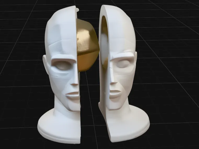 Split Face Sculpture with Floating Sphere