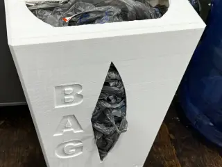 GROCERY BAG STORAGE AND DISPENSER