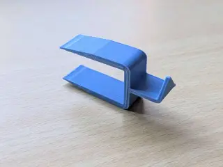 Table mounted clothes hanger