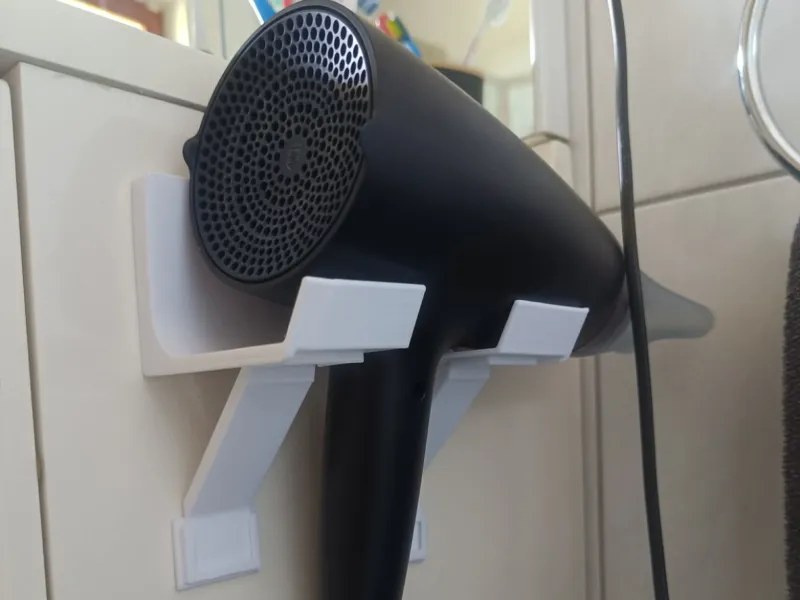 Verstevigde haardrogerhouder