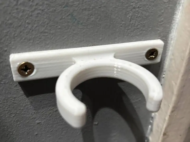 Henry hoover pipe wall mount