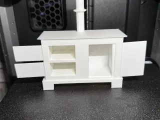 Stove with sliding doors