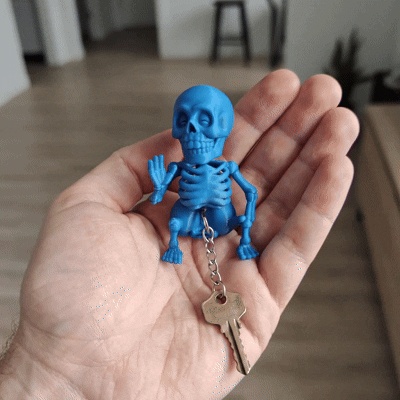 Squatting Skeleton Keyring