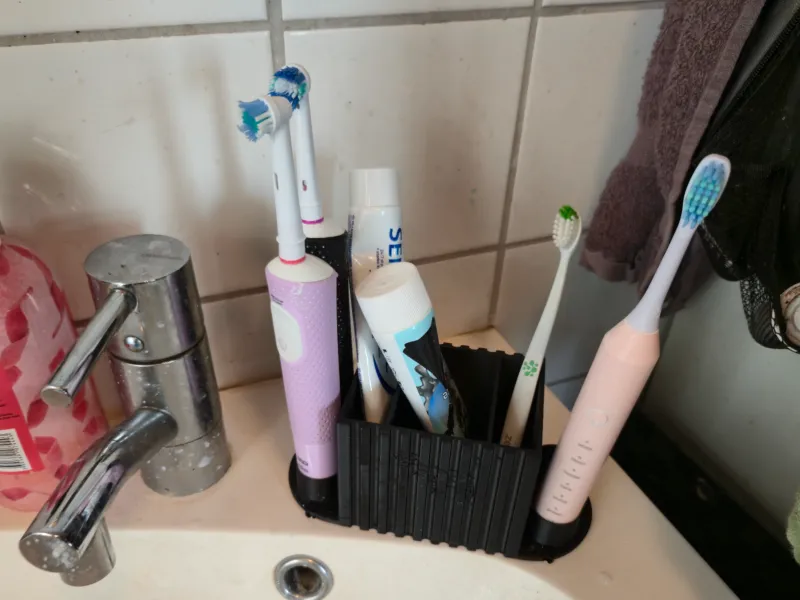 Suporte para pasta de dente e escova de dentes elétrica