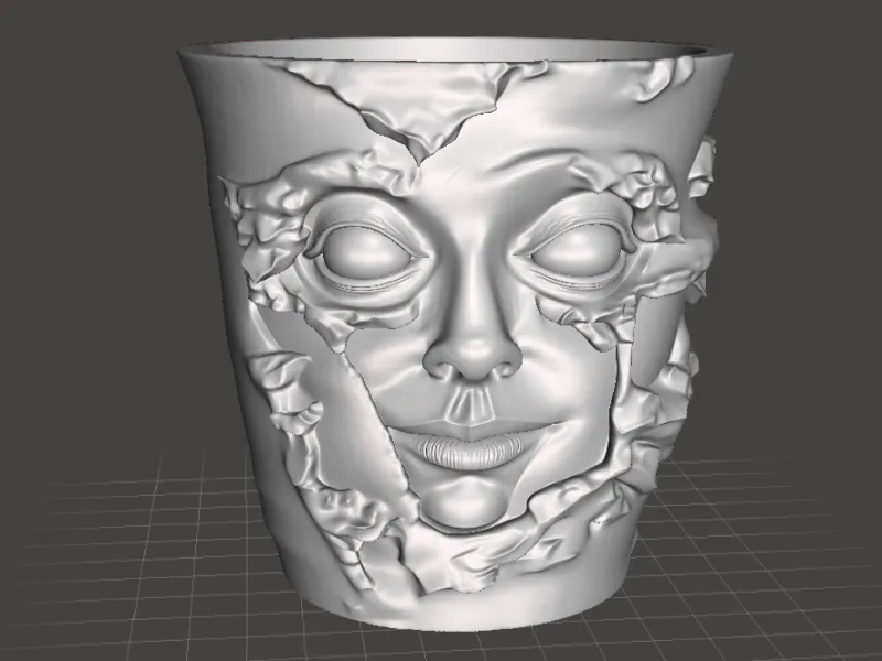 Embossed Face Design Cup