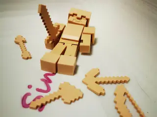 Minecraft Steve and his armor with tools.