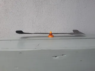 Lawnmower blade balancer